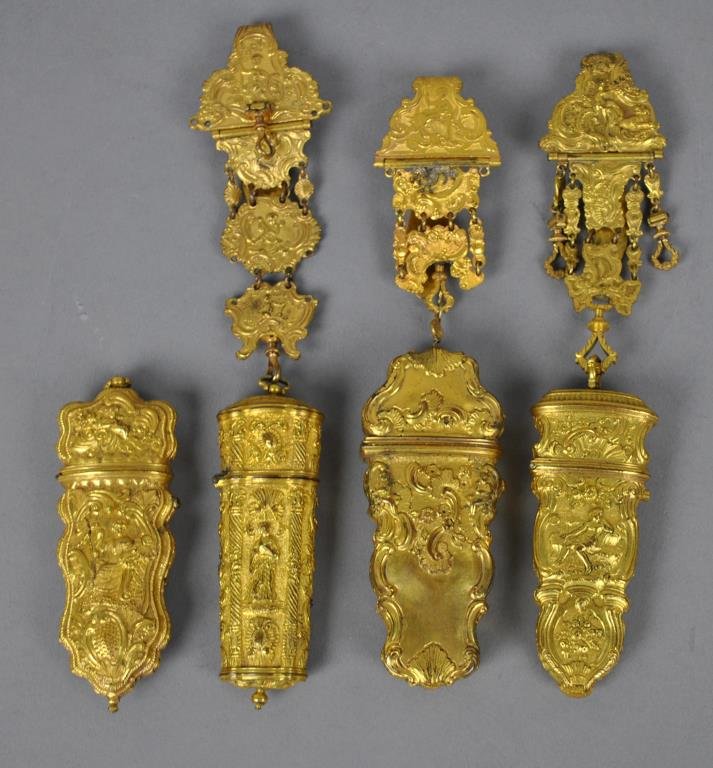 (4) GILT METAL CHATELAINES, GEORGE III OR FRENCH: two containing most of their tools, another with no tools, and the last empty with no tool holders or chains (approx. 1" crack), most lengths approx. 8in.