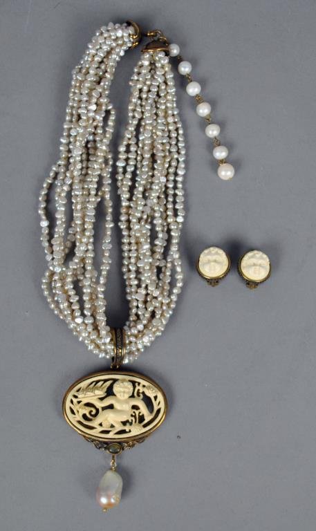 EXTASIA BAROQUE PEARL & IVORY CHOKER & EARCLIPS: comprising a multi-strand baroque pearl choker with ivory cherub pendant signed Extasia, choker 15in., pendant height 3in. including baroque pearl drop, width 2.25in., and a pair of complimenting cher