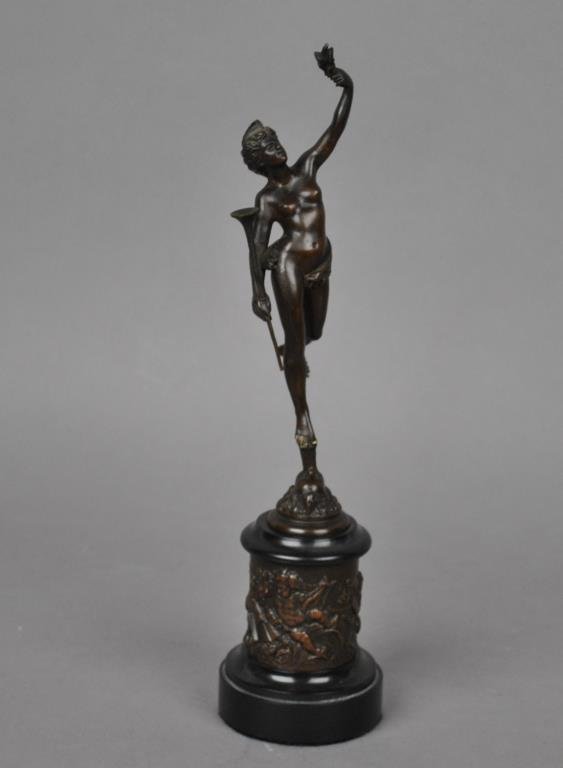 BRONZE SCULPTURE OF NUDE VENUS WITH HORN: likely after Giambologna, draped loin cloth, standing upon a mask, black slate and bronze allegorical relief cast base, overall 12in.