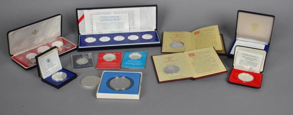 INTERNATIONAL SILVER COIN & COMMEM. COLLECTION: includes 3 Panama 20 Balboa coins by the Franklin Mint, each weighing 4.2ozt., dating 1972, 1974 & 1979, 2-Cayman Islands Six-Queens silver coin dating 1976 & 1976 weighing 2ozt. each, Cayman Islands 