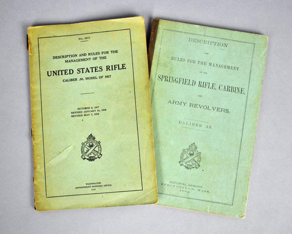 (2) RIFLE BOOKS: ORDNANCE DEPT U.S.A., 1882 & 1918: Description and Rules for the Management of the Springfield Rifle, Carbine, and Army Revolvers. Caliber .45., National Armory, Springfield, Massachusetts, 1882 (stiff wraps, some soiling, browning and