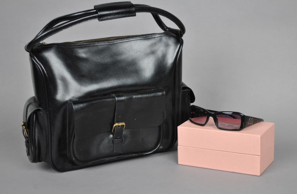 MIU MIU BLACK LEATHER BAG & SUNGLASSES: bag measures 11x14in. (not including strap), sunglasses with original case
