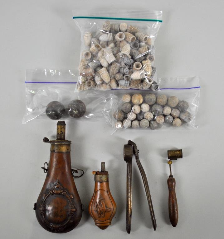 CIVIL WAR ERA GROUP: Including 85 bullets and 25 lead and iron balls of various sizes, 2 copper powder horns (longest 8in.), a powder measure and a crimping tool