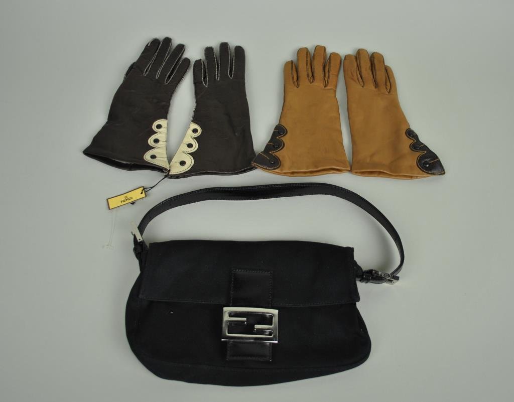 3-PIECE FENDI GROUP: including a small black bag with leather buckle and handle, 6x10in., and two pairs of gloves, sz. 6