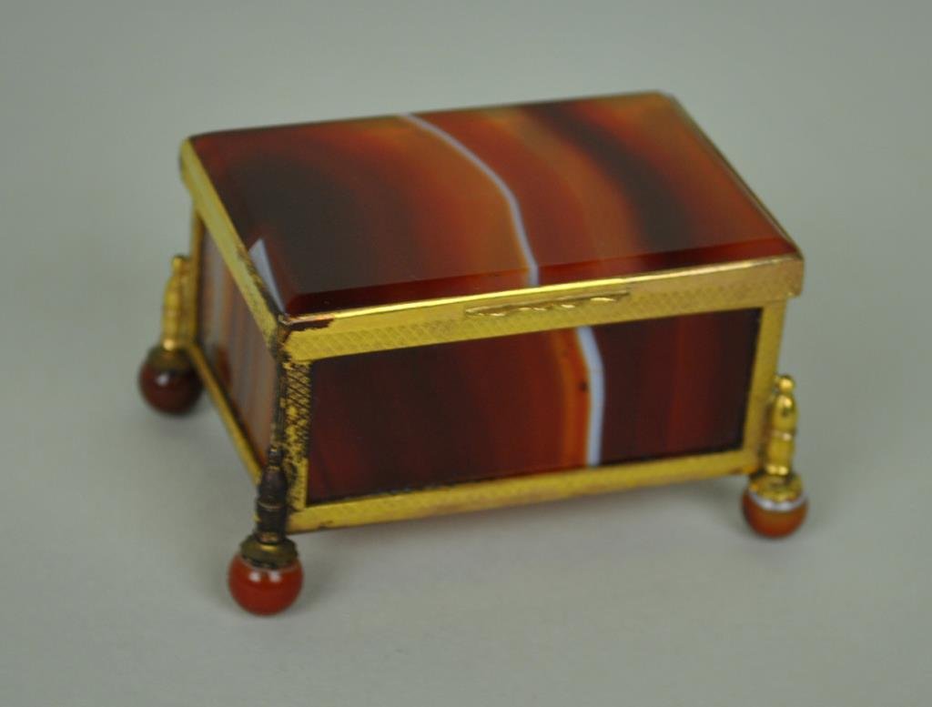 ENGLISH CARNELIAN AGATE JEWEL BOX: on carnelian ball feet, 1.5x2.25in., some tarnish / wear to metal, Estate Collection
