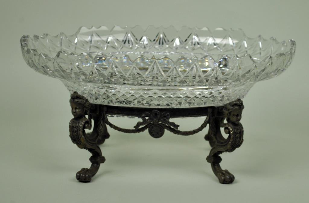 CRYSTAL CENTERPIECE BOWL WITH PAIRPOINT STAND: 19thC., plated stand signed 'Pairpoint C5558 Best Plate', unsigned bowl likely Pairpoint, overall 7x14in., bowl with light wear and scuffs to interior, a few flakes/chips to foot, stand with one side 