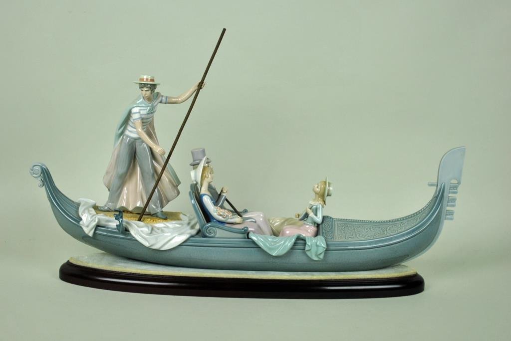 LLADRO FIGURINE - IN THE GONDOLA: #1350, artist signed and numbered 2152, with framed COA dated September 1982, 17x31.5in., with detached base, overall 18.5x31.5in.