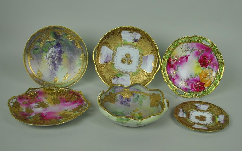 (5) NIPPON CABINET PLATES AND A BOWL: including 2 matching gilded plates with scenic panels (8-10.5in.), a lilac motif plaque with gilded leaves, 2 blush painted floral plates with heavy gilt decoration, and a grape decorated ruffled bowl