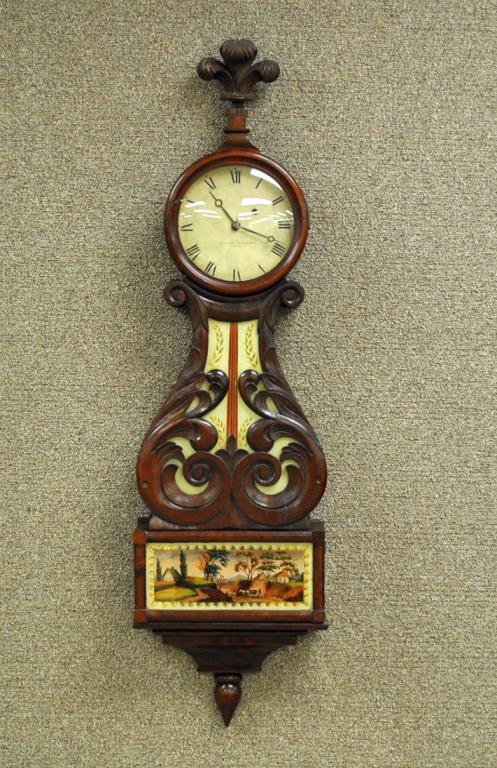 SIMON WILLARD LYRE-FORM FEDERAL BANJO CLOCK: the Roman numeral dial over an eglomise throat piece with gilt foliate and maroon stripes decoration, glazed lower panel depicting a farm scene with gilt surround, carved fleur de lis finial is replac