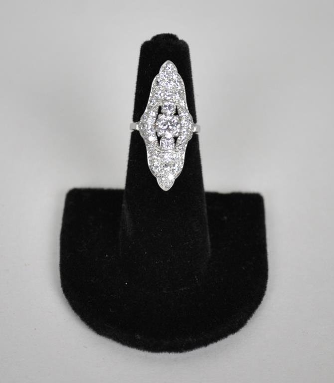 ART DECO PLATINUM & DIAMOND RING, 2.00CTW: set with 47 round diamonds approx. 2.00 carats (center diamond 0.65 carats), band stamped '900 PLAT 100 IR', size 4.5, 6.7gms. Opening Bid: $1500/