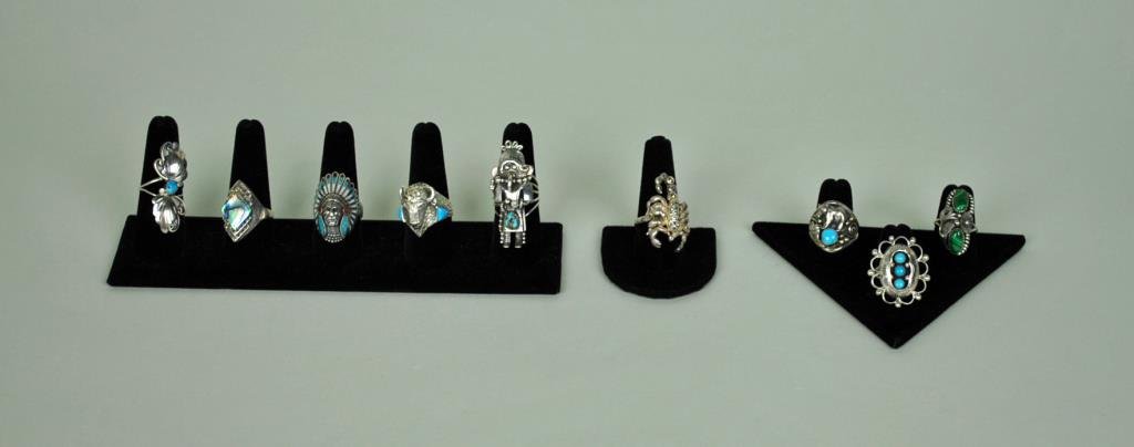 (8) NATIVE AMERICAN STERLING RINGS: including 4 signed examples (LP, TT?, Nakai, NF?), together with an unmarked silvertone marcasite scorpion ring missing one stone to eye