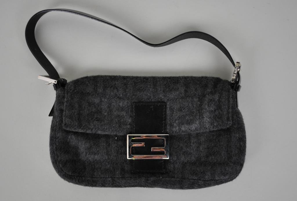 SMALL FENDI CHARCOAL GRAY HANDBAG: material likely wool, with black leather accents and lining, with dust bag, 6x11in.