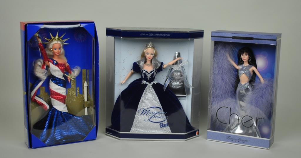 (3) COLLECTIBLE DOLLS: including Statue of Liberty Barbie, Millennium Barbie, and a Timeless Treasures Cher doll by Mattel, all MIB