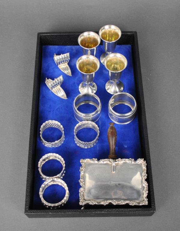 (13) PIECE STERLING TABLEWARES GROUP: including 6 napkin rings, 4 kiddush cups, 2 ship-form salt shakers, and a silent butler, 15.1ozt., Estate Collection