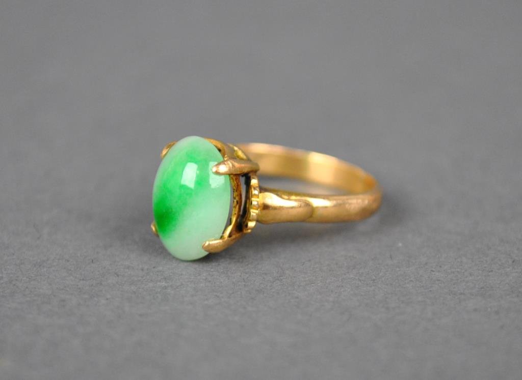 22K JADE RING: set with a single stone approx. 10x8mm, yellow gold setting stamped 22K, size 5, 3.5gms., Estate Collection