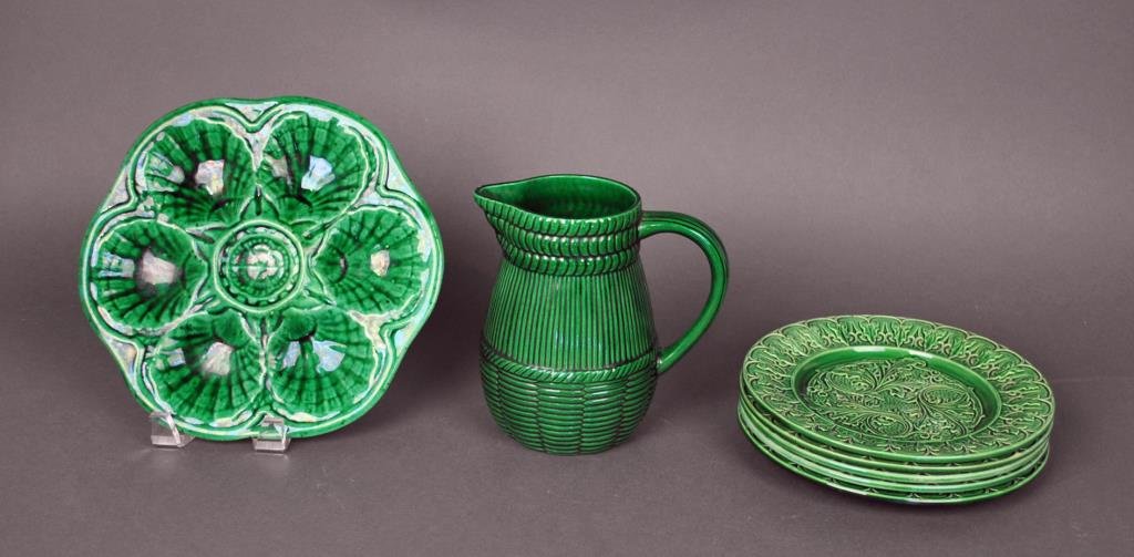 FRENCH MAJOLICA GREEN (7) PIECE GROUP: including a 7" signed St. Clement pitcher, a 9.5" oyster plate, and five 8" plates, Estate Collection