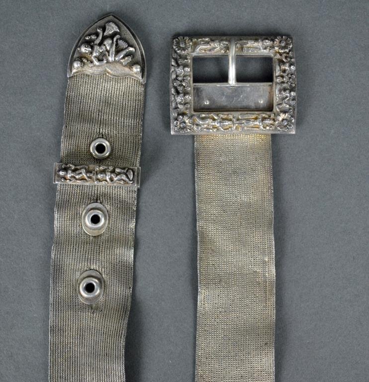 INDONESIAN SILVER MESH BELT: with figural repousse accents, 27.5in., tests silver, 5.3ozt., Estate Collection