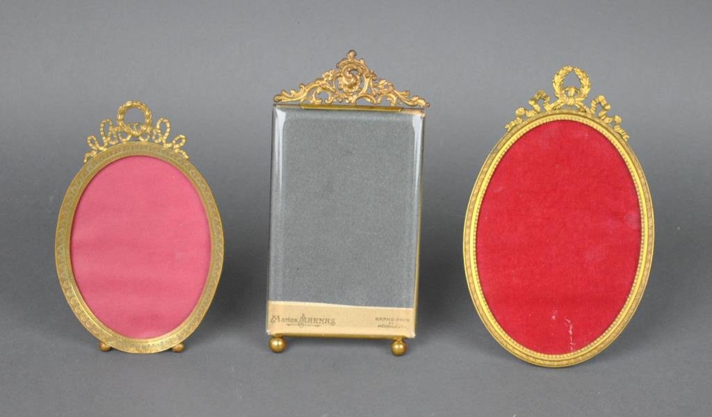 (3) FRENCH BRASS PICTURE FRAMES: all with easel backs and hang rings, largest opening size 7.75x4.5in., overall 8.5x5.5in. Estate Collection