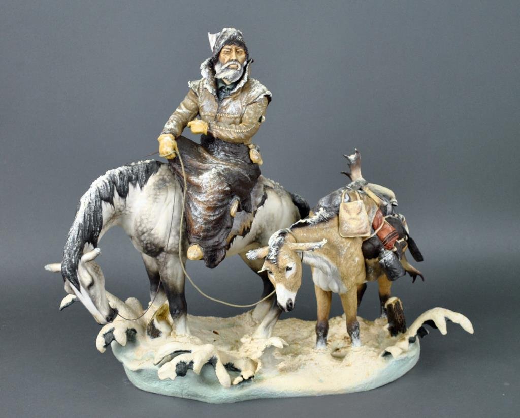 BRONN FIGURAL GROUP - WILDERNESS ROAD: limited edition #7 of 25, Bronn hallmark, 22x24x13in., hat feather broken off but present, rifle detached from glue but present, minor rawhide loss to rifle scabbard