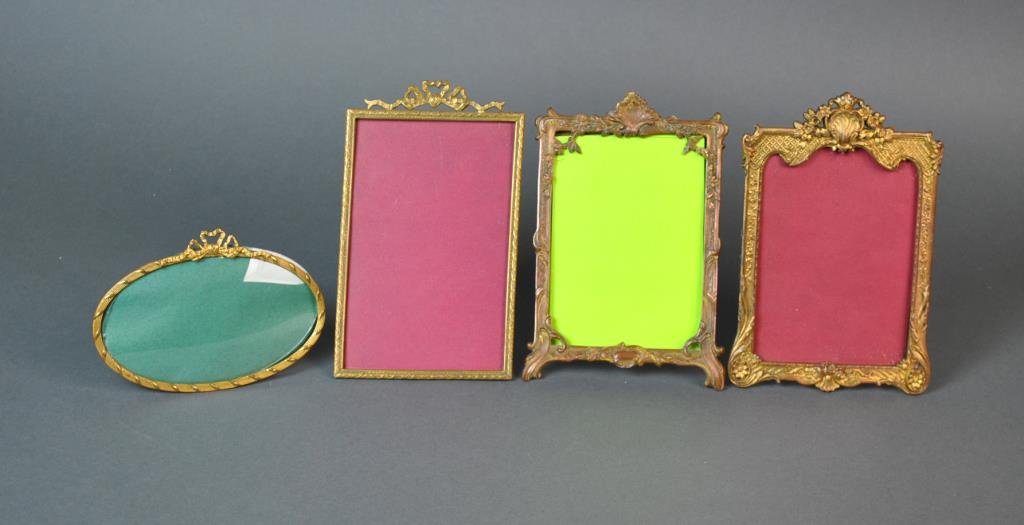 (4) FRENCH BRASS PICTURE FRAMES: all easel backs, one with hang ring, largest opening size 6.5x4.25in.