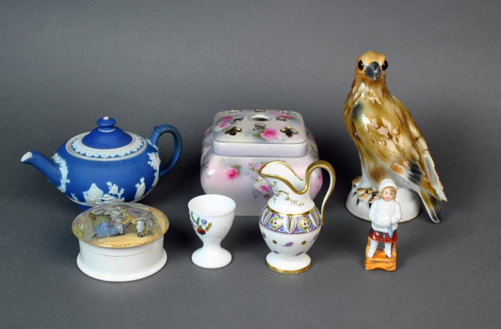 (7) PIECE CONTINENTAL PORCELAIN GROUP: including a Wedgwood teapot, an enamel decorated opaline creamer, an English potpourri jar (Versailles), a Czechoslovakian hawk figure and egg cup, an Uncle Toby Prattware lid with base, and a snow ch