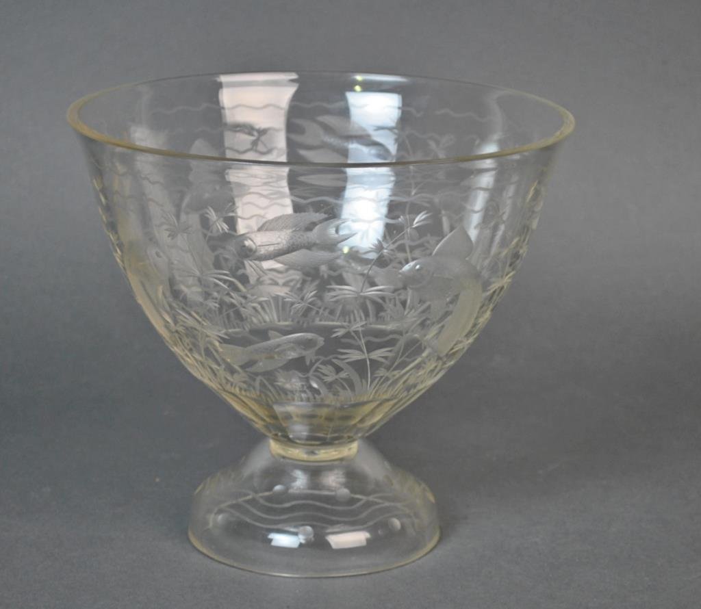 INTAGLIO CARVED KOI CENTER BOWL: depicting swimming goldfish or koi amongst plant life, in high detail, round foot, faceted base, unsigned, 7.25x8in.