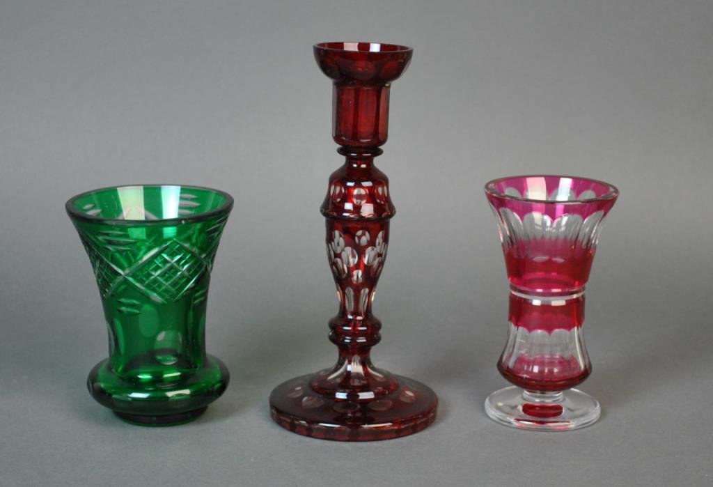 (3) PIECE CUT TO CLEAR GLASS GROUP: including a cranberry footed vase, likely Val St. Lambert, and a Bohemian vase and candlestick, tallest 9in.