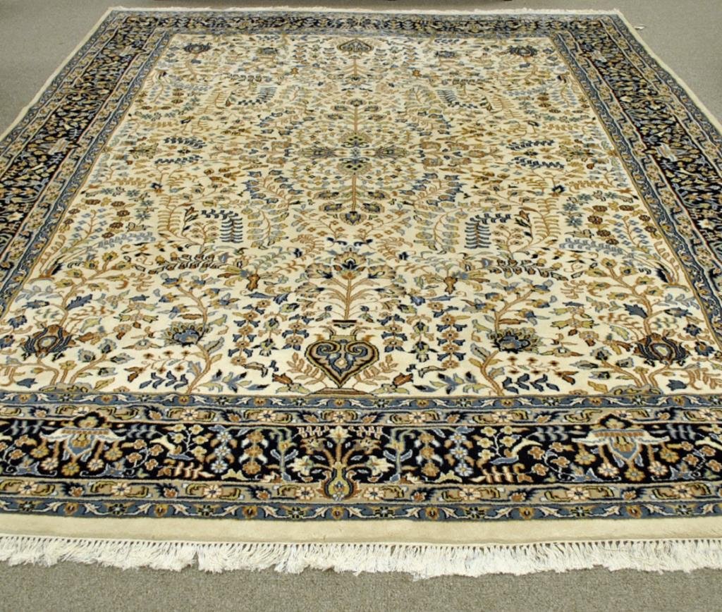 TABRIZ RUG, 11.5 X 8.5: hand knotted in blue and beige tones on cream ground, Mori Tabriz label, certificate from Rug Weavers of Iran