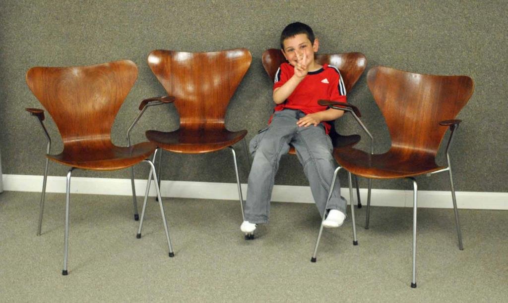 (4) ARNE JACOBSEN FOR FRITZ HANSEN 3107 CHAIRS: c.1950, 2 with arms, teak plywood and metal construction, FH Made in Denmark incised on metal base cap, 29x19x18in., 24in. width with arms, structurally sound, exceptionally light wear to wood, severa