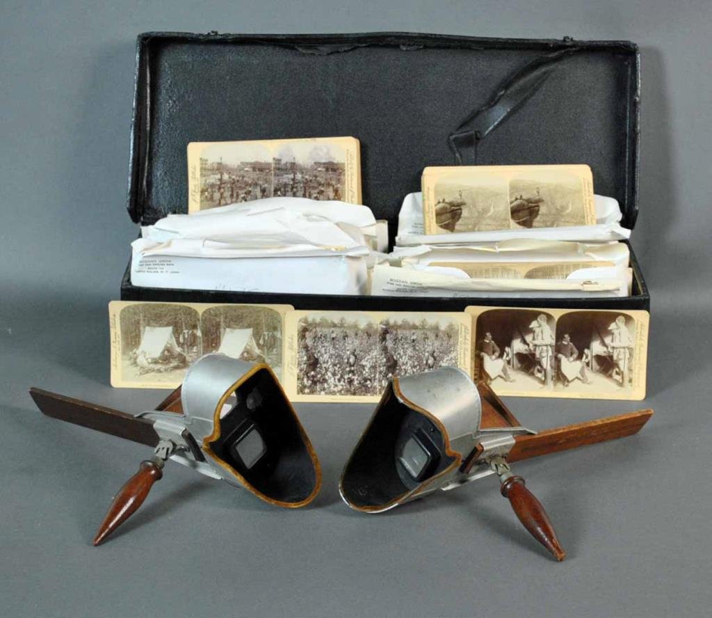 (2) UNDERWOOD STEREOSCOPE VIEWERS AND CARDS: with 100+ stereo cards including mostly travel, including Africa (one of explorer Stanley and Major Bartellot), China, Norway, France, England, Mexico, Switzerland, Japan, etc., US examples include Ne
