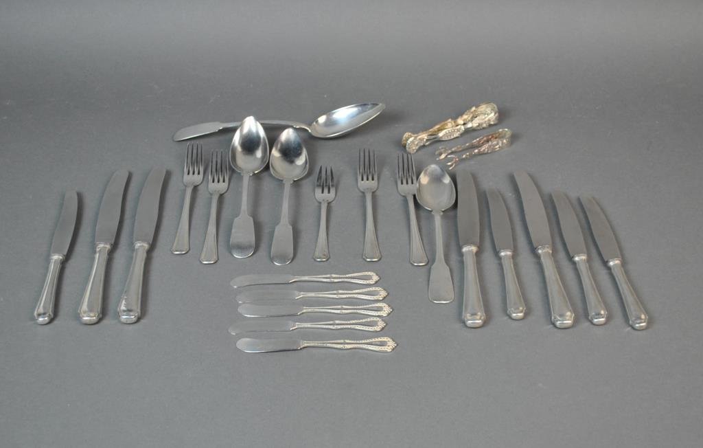 (24) PIECE ASSORTED SILVER FLATWARE GROUP: most German, 800 silver includes 5 forks, a fiddle design serving spoon, bird claw ice tongs, and 8 silver handled knives, coin silver includes 3 serving spoons in fiddle design (stamped J. Herz, Scha