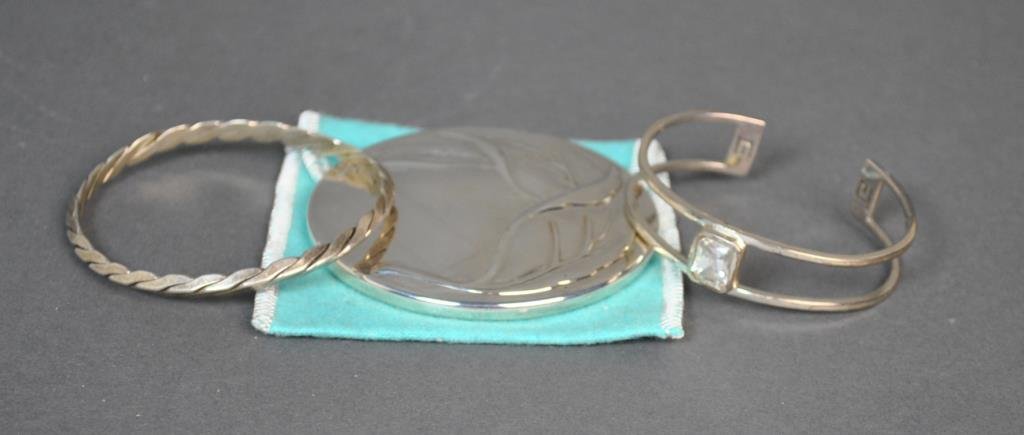 (1) GIVENCHY & (2) TIFFANY & CO. ACCESSORIES: including a Givenchy sterling cuff bracelet, a Tiffany & Co. sterling bracelet, and a Tiffany & Co. silverplate purse mirror in leaf design with original pouch