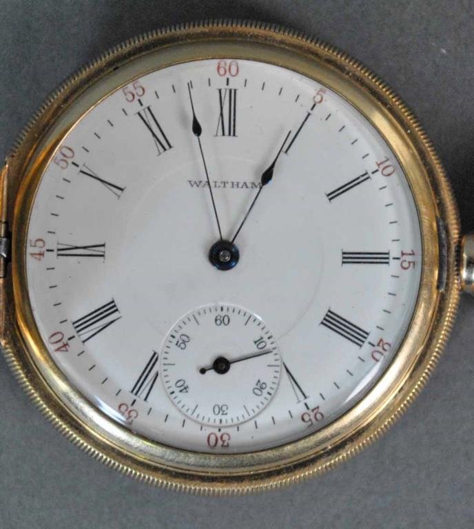 GENT’S 14K HUNTER CASE WALTHAM POCKET WATCH: model 1899, watch #15831693, size 16s, 17 jewels, engraved A.W.W.CO., Waltham, Mass., BWC hunter case #6406266, stamped 14K, currently running however not guaranteed
