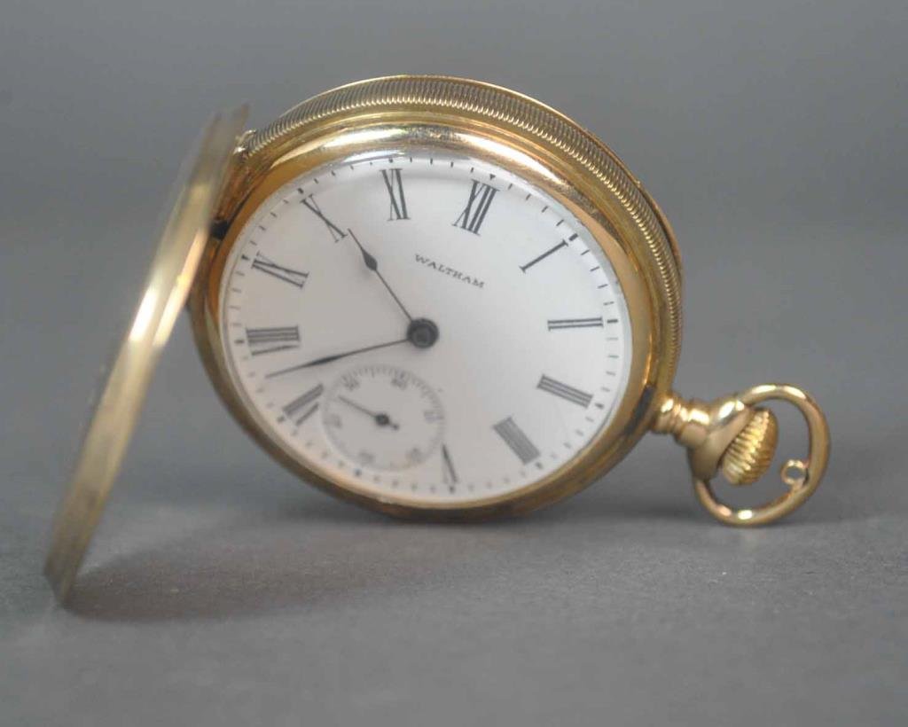 GENT’S 14K HUNTER CASE WALTHAM POCKET WATCH: model 1899, watch #11393124, size 16, 7 jewels, engraved A.W.W.CO., Waltham, Mass., hunter case #107466 stamped ‘Warranted, 14K, US Assay’, with monogrammed shield ‘MJF’, not running but compl