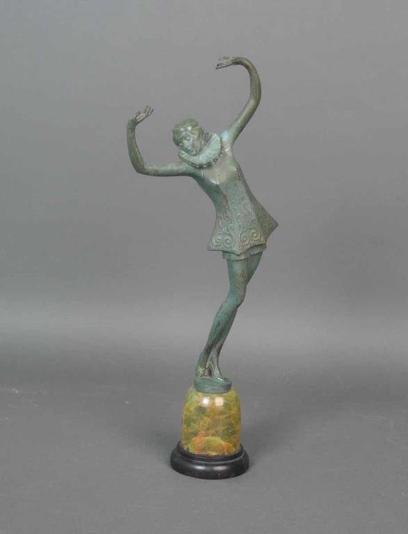 JOSEF LORENZL (Austrian, 1892-1950): an Art Deco harlequin dancer, cold painted bronze, on agate base with slate mount, signed 'Lorenzl' by foot, and 'Austria' to the underside, overall 16.5in., surface wear and rubs, chips to slate