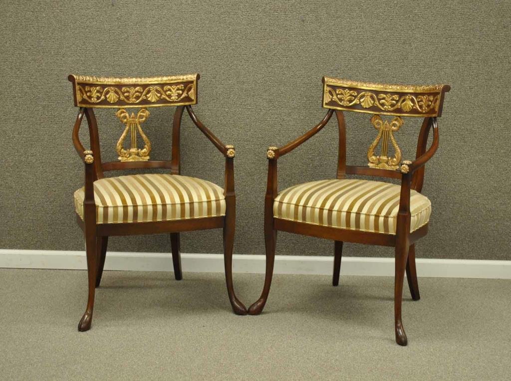 PAIR NANCY CORZINE GILTWOOD DECORATED CHAIRS: in Regency style, dolphin lyre back, front camel foot feet, label of Nancy Corzine Furniture, 35.5x26x25in.
