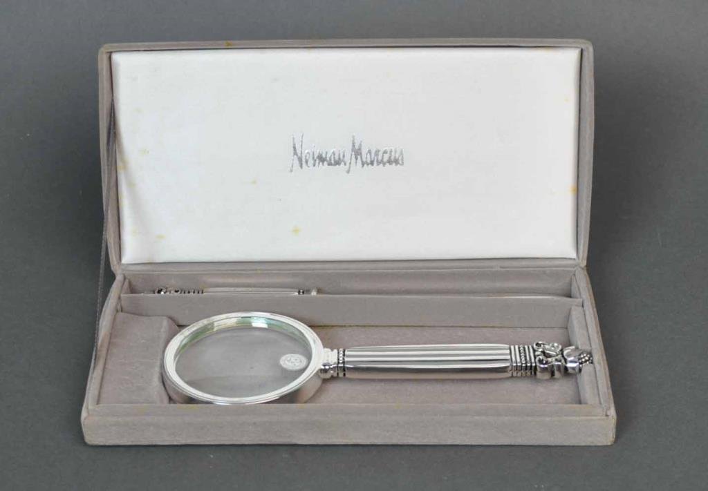 GODINGER MAGNIFYING GLASS AND LETTER OPENER: with Jensen-style pineapple decoration, in Neiman Marcus presentation case with original labels, opener length 8.25in., case in used condition