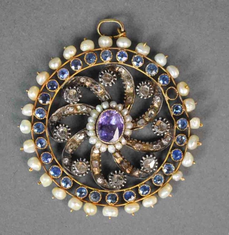 ANTIQUE DIAMOND, PEARL & GEMSTONE PENDANT: set with a center faceted amethyst (10x8mm), 32 rose cut diamonds approx. 1.35 carats, and 27 round faceted blue stones (one missing), accented with seed pearl and baroque pearl surrounds, yellow gold