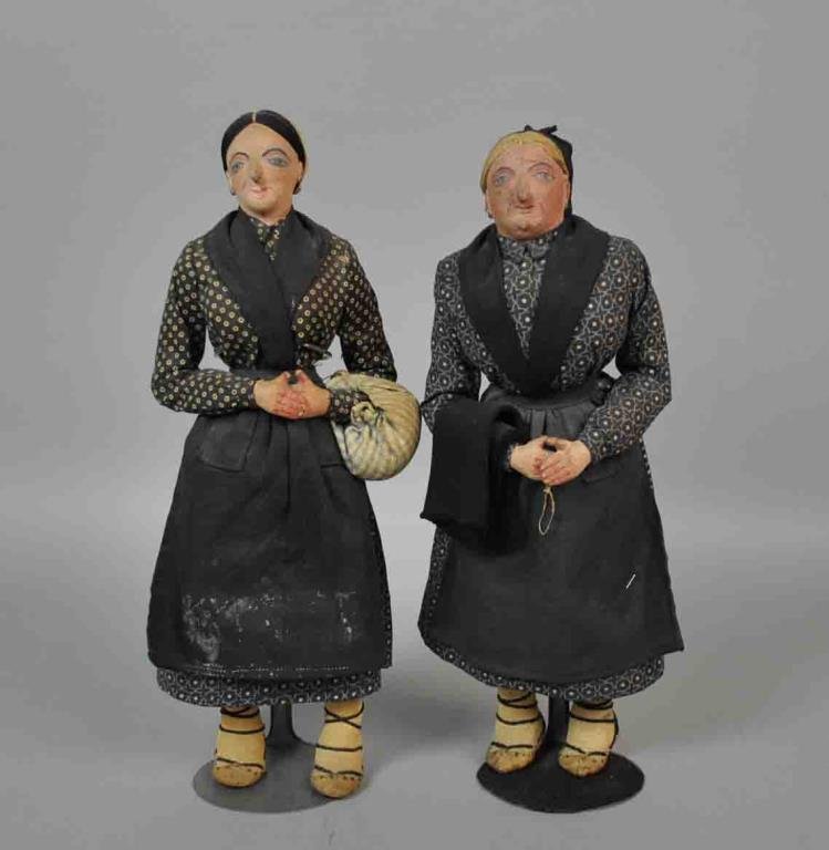 (2) PAINTED SPANISH BASQUE PEASANT LADY DOLLS: stitched cloth bodies and head, painted faces and hands, painted leather sandals, authentic Basque-style clothing, 12in. Note: These are purported to have once belonged to Ernest Hemingway, see refere