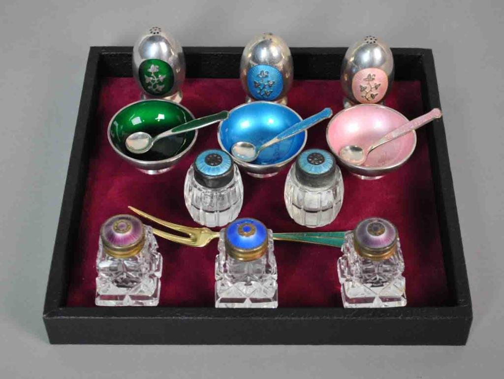 (15) SCANDINAVIAN ENAMELED STERLING GROUP: comprising 11 MEKA pieces including 3 each shakers, open salts and spoons, and 2 crystal shakers, a David Anderson hors d'oeuvres fork, and 3 unidentified shakers stamped Sterling (W), tallest 2in.