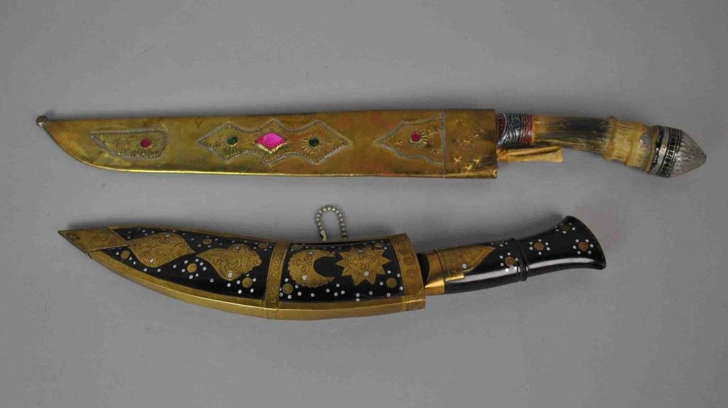 (2) CONTEMPORARY MIDDLE EASTERN STYLE DAGGERS: complementing, both with curved blades, jeweled handles and scabbards, brass wire wrapped and decorated, unmarked, each overall 19.5in.