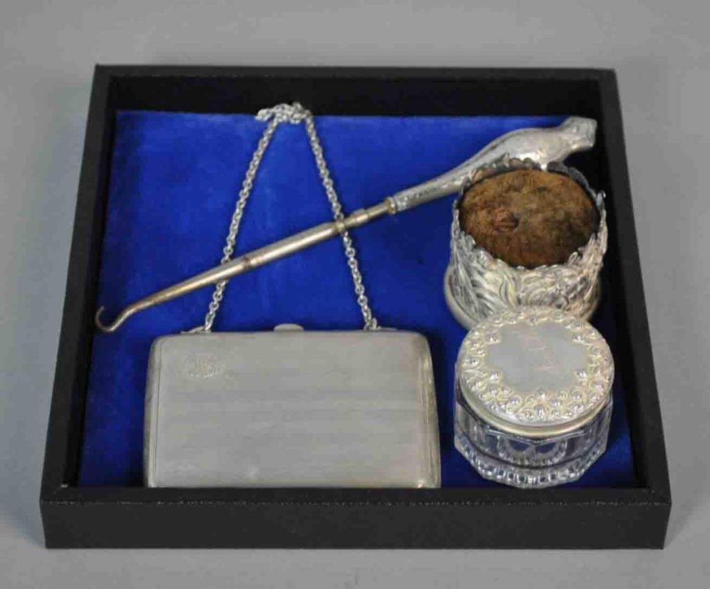 (4) PIECE STERLING VANITY GROUP: including an evening purse, a pin cushion, a vanity jar, and an 8" button hook, most monogrammed, 4ozt.