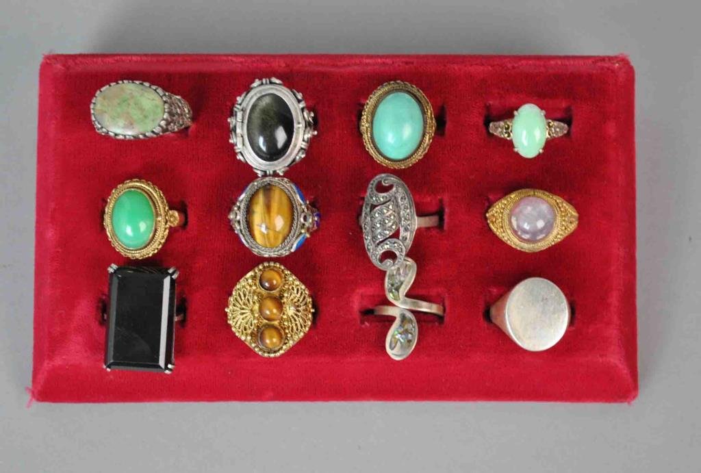 (12) SILVER RINGS: including 3 poison rings, tiger eye, jade, marcasite, filigree, etc., all stamped or tested silver