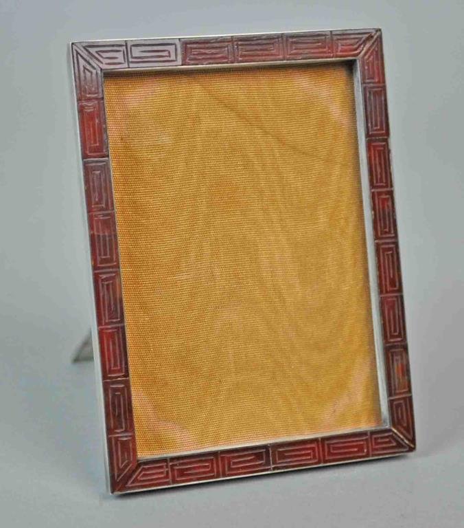 YAMANAKA & CO. SILVER & CARNELIAN PICTURE FRAME: easel back, carved carnelian exterior, stamped ‘Yamanaka & Co. Made in Japan’, no glass, opening 3.5x2.75in., tests sterling