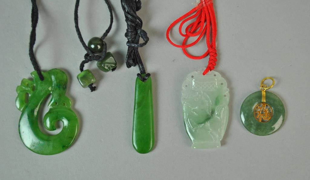 (4) CHINESE CARVED JADE PENDANTS (1 of 1)