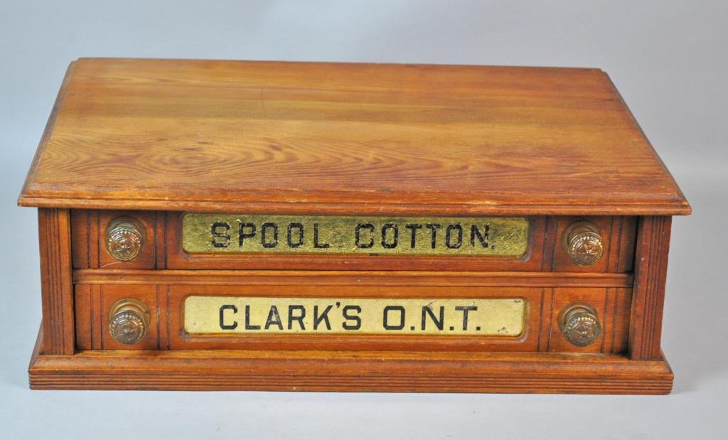 CLARKS 2-DRAWER SPOOL CABINET: brass knobs, top sun faded, 8x22x15in.