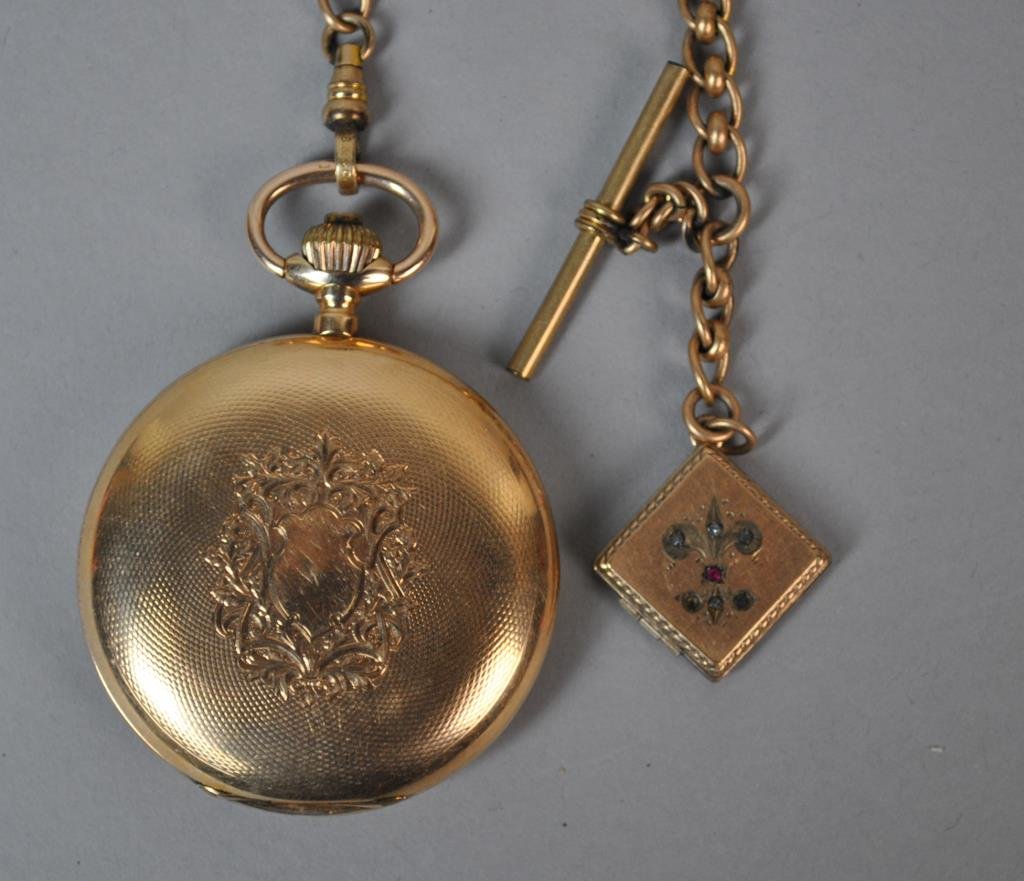 14K SWISS HUNTER CASE POCKET WATCH: machine turned full hunter yellow gold case with shield, dial unsigned, 43mm unsigned movement, front, back and dust covers stamped '585 #175571, E&M’, with Swiss squirrel punches, watch diameter 52