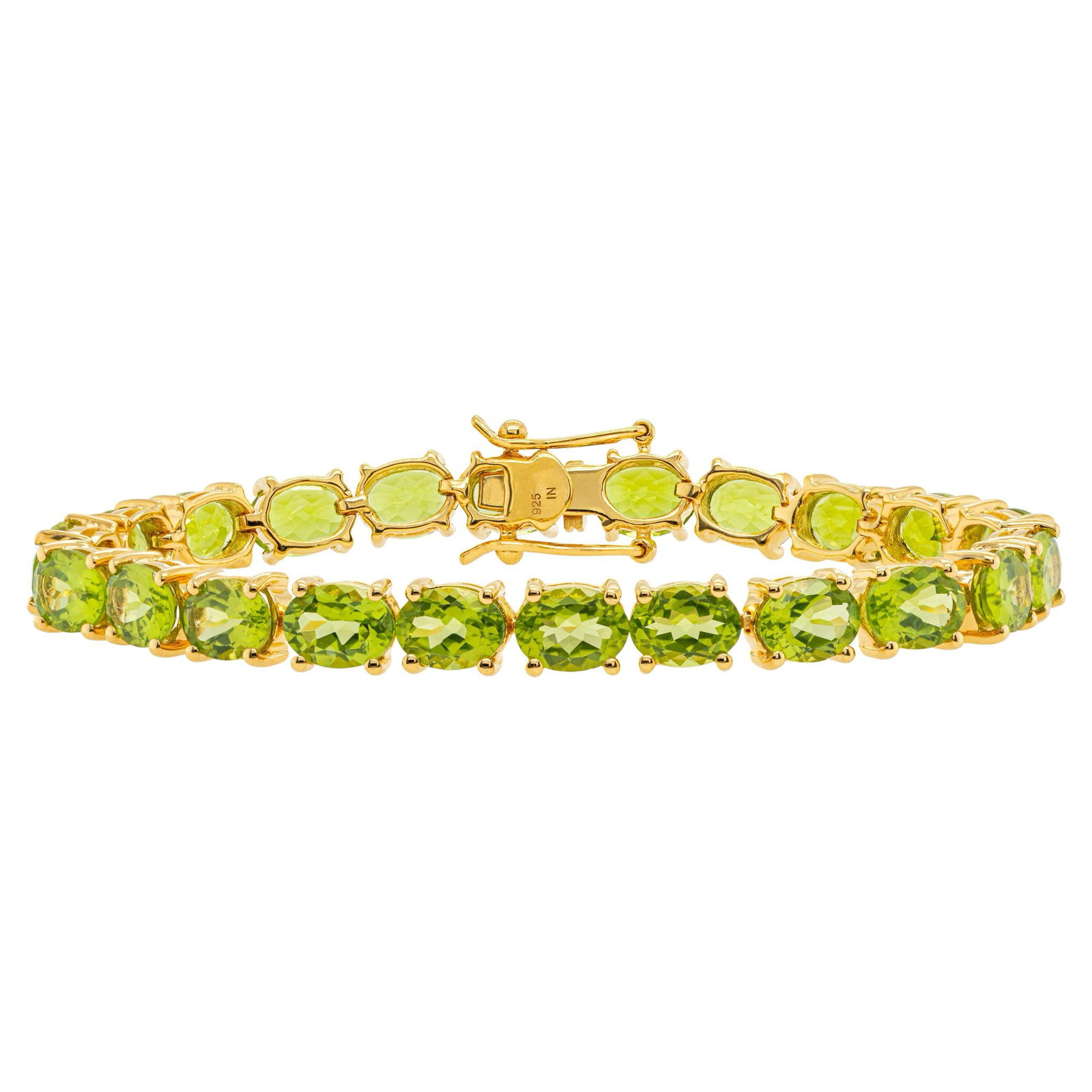 Luxurious Peridot Bracelet 24.00 Carats 24K Yellow Gold Plated Sterling Silver: Accompanied by Gemological Appraisal by GIA GG/AJP Appraised value: $1,000 All gemstones are natural in origin 22 Peridots = 24.00 ct Metal: 24K Yellow Gold Plated Sterling Silver Length: 7 Inches *It
