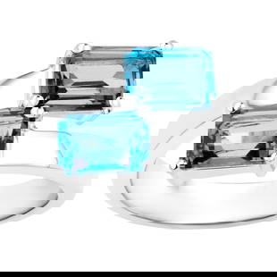 London Blue Topaz Bypass Ring 2.44 Carats: Accompanied by Gemological Appraisal by GIA GG/AJP Appraised value: $480 All gemstones are natural in origin 2 London Blue Topazes = 2.44 ct Metal: Rhodium Plated Sterling Silver Ring Size: 7 US