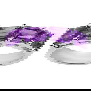 Natural Amethyst Band Ring 2.24 Carats: Accompanied by Gemological Appraisal by GIA GG/AJP Appraised value: $400 All gemstones are natural in origin 4 Amethysts = 2.24 ct Metal: Rhodium Plated Sterling Silver Ring Size: 7 US Resizing on